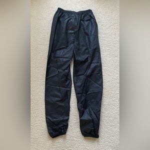 Body wrappers trash bag dance pants, size medium, black